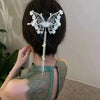 Accessoire pour cheveux avec pince à cheveux papillon et pompon Jane Twist